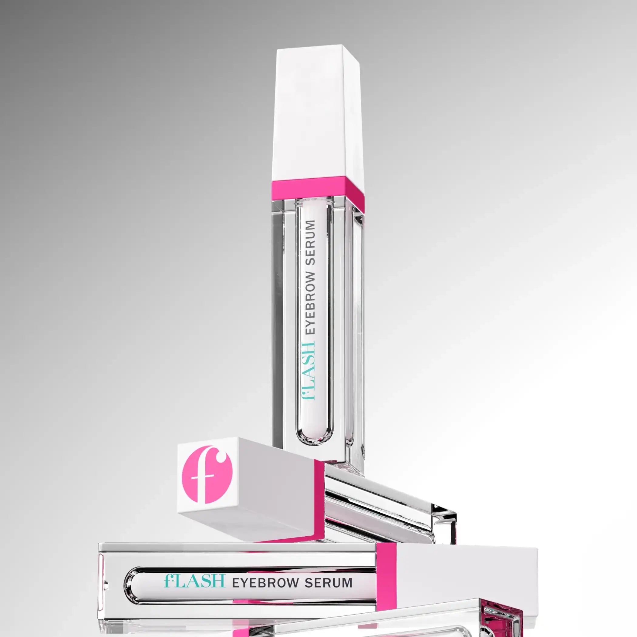 fLASH Eyebrow Serum clear tubes with white and pink caps, stacked on gray gradient background